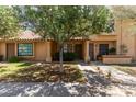 Inviting townhouse featuring a well-manicured lawn and charming desert landscaping at 5704 E Aire Libre Ave # 1093, Scottsdale, AZ 85254