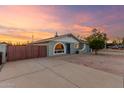 Inviting single-story home with a modern paint scheme and well-maintained landscaping at 332 S 83Rd Pl, Mesa, AZ 85208