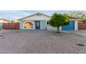 Attractive home featuring a well-manicured yard and updated exterior paint, creating curb appeal at 332 S 83Rd Pl, Mesa, AZ 85208