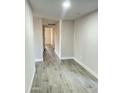 Neutral hallway features sleek tile floors and updated wall paint at 4902 S Fair Ln, Tempe, AZ 85282