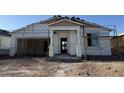 Exterior shot of a home under construction with visible framework and materials at 18260 W Camino De Oro --, Surprise, AZ 85387