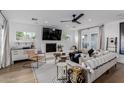 Cozy living room with fireplace, comfortable seating, and access to the outdoors at 4117 E Coolidge St, Phoenix, AZ 85018