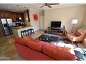 Open-concept living space with modern decor, including a comfortable sofa and stylish furnishings at 5345 E Van Buren St # 115, Phoenix, AZ 85008