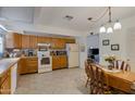 Eat-in kitchen featuring wooden cabinets and neutral color palette at 1559 S Padre Rd, Apache Junction, AZ 85119