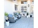 Relaxing outdoor patio with comfortable seating, tiled flooring, and stylish decor at 16414 S 36Th St, Phoenix, AZ 85048