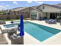 Gorgeous pool with spa, lounge chairs, and a serene backyard oasis at 3118 E Gary Way, Phoenix, AZ 85042