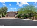 Beautiful single-story home features desert landscaping and a spacious three-car garage at 31409 N 58Th Pl, Cave Creek, AZ 85331