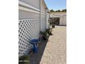 View of home's side yard, driveway and additional storage at 3330 E Main St # 430, Mesa, AZ 85213
