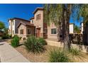 Charming two-story home boasting desert landscaping and a welcoming entrance at 10370 W Sands Dr # 463, Peoria, AZ 85383