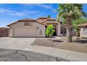 Inviting single-story home featuring a tile roof, desert landscaping, and an attached two-car garage at 1245 W Cindy St, Chandler, AZ 85224