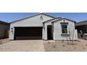 Charming single-story home with stucco siding, a dark brown garage door, and low-maintenance landscaping at 18240 W La Senda Dr, Surprise, AZ 85387