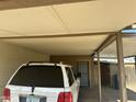 Carport area with covered parking and access to the side of the house at 5735 N 32Nd Dr, Phoenix, AZ 85017
