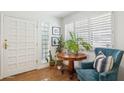 Inviting room featuring plantation shutters, artwork, and comfortable seating at 2236 E Sierra St, Phoenix, AZ 85028