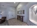 Spacious foyer with tiled floors, high ceilings, and double-door entrance at 8026 W Villa Lindo Dr, Peoria, AZ 85383