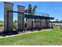 The Destination at Gateway community entrance sign, beautifully landscaped with modern architectural features at 11338 E Utah Ave, Mesa, AZ 85212