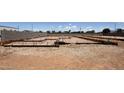 Residential construction site, showing prepared foundation with rebar grid for a new home at 11338 E Utah Ave, Mesa, AZ 85212