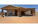 New construction home featuring wood framing and a two-car garage ready for customization and future Gathering memories at 11338 E Utah Ave, Mesa, AZ 85212