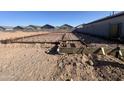 Foundation preparation with rebar grid and wooden framework, showcasing the building process at 47705 W Kenner Dr, Maricopa, AZ 85139