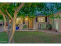 Charming front porch featuring potted plants and room for seating, enhancing curb appeal at 803 W 18Th St, Tempe, AZ 85281