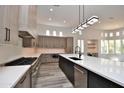 Spacious kitchen with stainless steel appliances, large island, and an abundance of natural light at 8934 E Rusty Spur Pl, Scottsdale, AZ 85255