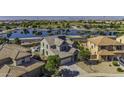 Beautiful home with a view of the lake and community park at 41581 W Somerset Dr, Maricopa, AZ 85138