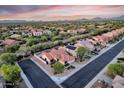 Birds eye view of a home with a red tile roof and well manicured landscaping in a residential area at 4208 E Hamblin Dr, Phoenix, AZ 85050