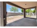 Enjoy the spacious covered patio and low-maintenance backyard, perfect for outdoor relaxation and entertaining at 2704 S 172Nd Ln, Goodyear, AZ 85338