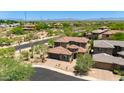 Scenic aerial view of a lovely home with well-kept landscaping and a tile roof at 3804 E Daley Ln, Phoenix, AZ 85050