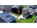 Unique aerial view of the building, showcasing green rooftop spaces and solar panels at 4808 N 24Th St # 923, Phoenix, AZ 85016