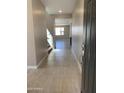Inviting entryway with tile flooring leading to the living spaces at 5004 W Brown St, Glendale, AZ 85302