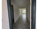 Inviting entryway showcasing tile flooring and an open floor plan, flooded with natural light at 18361 E Eloisa Dr, Gold Canyon, AZ 85118