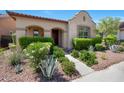Attractive single-story house boasts a well-maintained landscape and inviting walkway at 20699 W Ridge Rd, Buckeye, AZ 85396
