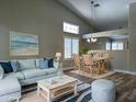 Inviting living room with vaulted ceiling, beach themed decor and lots of light at 351 N Newport St, Chandler, AZ 85225