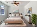 Cozy main bedroom with neutral decor, stylish furnishings, and a comfortable atmosphere at 4990 E Odessa Dr, San Tan Valley, AZ 85140