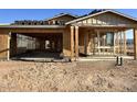 New construction featuring a framed two-car garage and first-story window at 5519 W Piedmont Rd, Laveen, AZ 85339