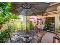 Relaxing outdoor patio with comfortable seating and lush greenery, perfect for entertaining at 7635 S Taylor Dr, Tempe, AZ 85284