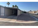 Manufactured home featuring covered parking at 9302 E Broadway Rd # 129, Mesa, AZ 85208