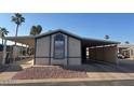 Manufactured home featuring covered parking at 9302 E Broadway Rd # 129, Mesa, AZ 85208