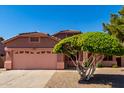 Attractive single-Gathering home with low-maintenance desert landscaping in a vibrant neighborhood at 11338 E Contessa St, Mesa, AZ 85207