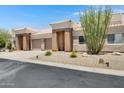 Attractive single-story home in a quiet neighborhood with desert landscaping at 16450 E Avenue Of The Fountain -- # 20, Fountain Hills, AZ 85268