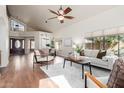 Spacious living room with vaulted ceilings, wood floors, and bright natural light at 2635 N El Dorado Pl, Chandler, AZ 85224