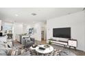 Open-concept living area with kitchen view, perfect for modern living at 40015 W Venture Rd, Maricopa, AZ 85138