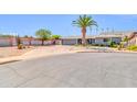Inviting single-story home with desert landscaping and a spacious driveway, perfect for families at 4363 E Dragoon Cir, Mesa, AZ 85206