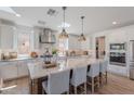 Bright, spacious kitchen with granite countertops, stainless steel appliances, and a large center island at 9645 E Ripple Dr, Mesa, AZ 85212