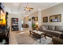 Inviting living room featuring neutral colors, tile floors, and natural lighting at 481 S San Marcos Dr, Apache Junction, AZ 85120