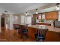 Well-equipped kitchen with granite countertops, stainless steel appliances, and breakfast bar seating at 6707 E Beverly Ln, Scottsdale, AZ 85254