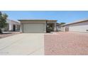 Charming single-story home with a two-car garage and desert landscaping in a friendly neighborhood at 11548 W Cottonwood Ln, Avondale, AZ 85392