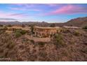 Expansive desert home featuring a large pool and patio with mountain views at 15054 E Sundown Dr, Fountain Hills, AZ 85268