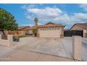 Charming single-story home boasting a spacious driveway and two-car garage in a well-maintained neighborhood at 1814 N 89Th Ave, Phoenix, AZ 85037