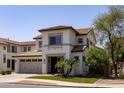 Charming two-story home with a well-manicured lawn and inviting front entrance at 18809 E Seagull Dr, Queen Creek, AZ 85142